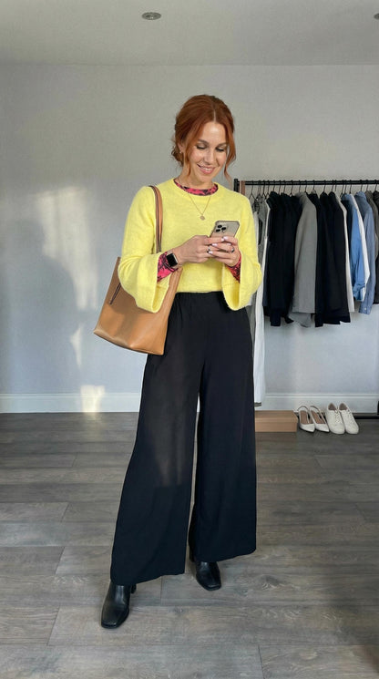 Czarne eleganckie spodnie damskie do pracy dzwony luźne na gumkę id:2317