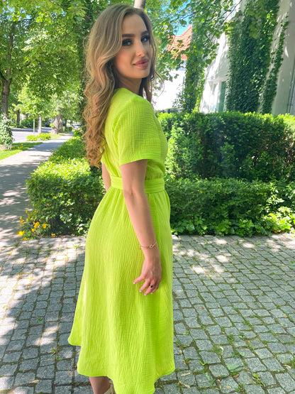 Bawełniana muślinowa sukienka midi w neonowym żółtym kolorze od:390