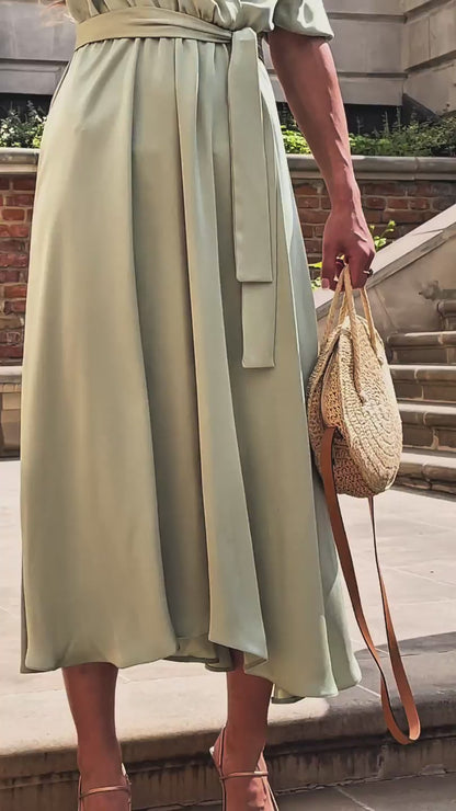 Pistacjowa sukienka na wesele satynowa z połyskiem z bufiastymi rękawami rozkloszowana  id:2167