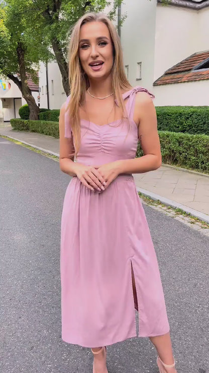 Pudrowo różowa sukienka dla druhen na wesele na ramiączkach z kokardami midi z wiskozy id:224